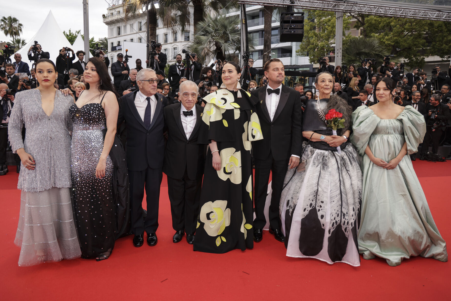 Janae Collins, from left, Cara Jade Myers, Robert De Niro, director Martin Scorsese, Lily Gladstone, Leonardo DiCaprio, Tantoo Cardinal and Jillian Dion pose for photographers upon arrival at the premiere of the film 'Killers of the Flower Moon' at the 76th international film festival, Cannes, southern France, Saturday, May 20, 2023.