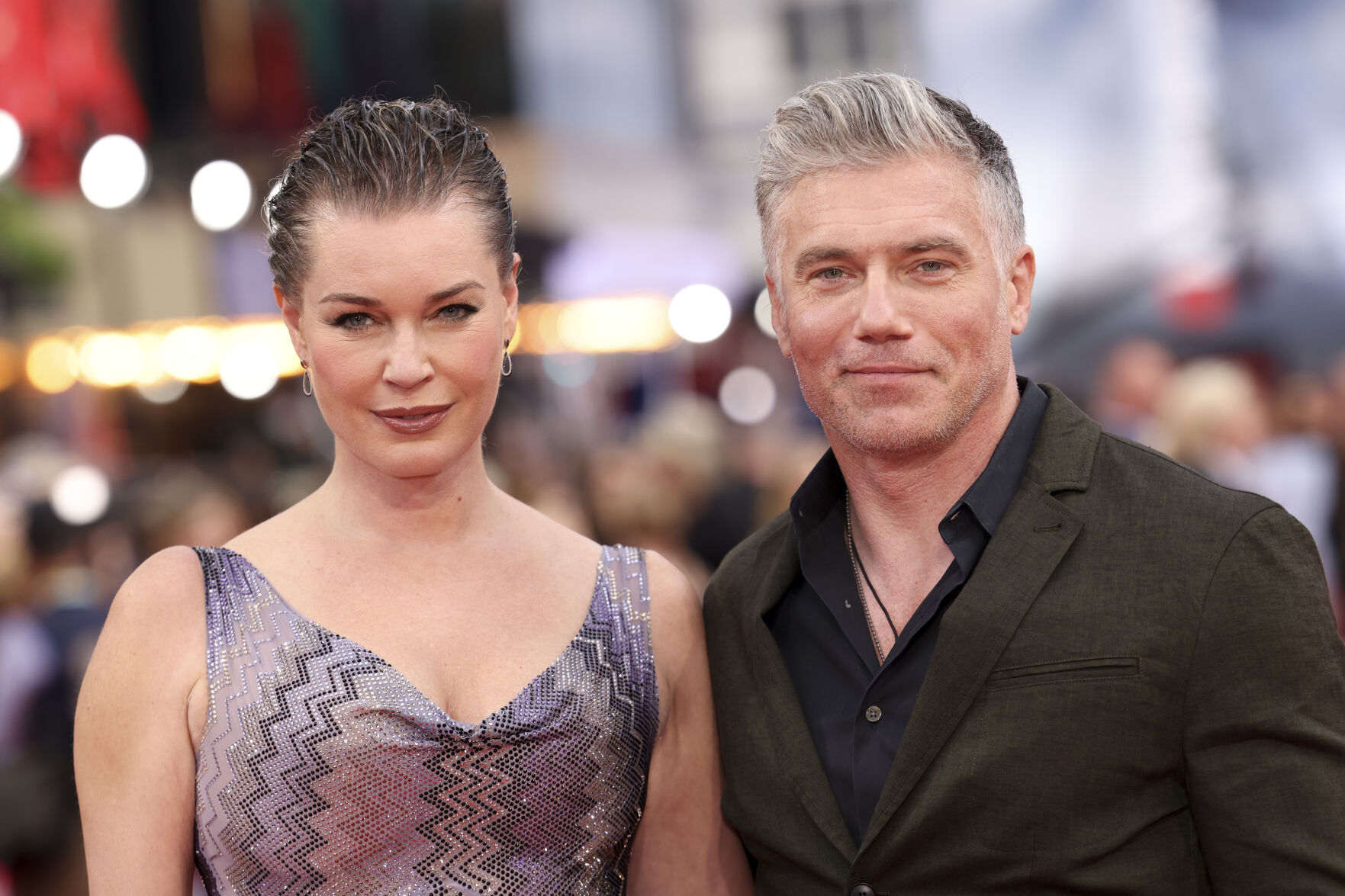 Rebecca Romijn and Anson Mount pose for photographers upon arrival at the premiere of the film 'Mission: Impossible - Dead Reckoning Part One' on Thursday, June 22, 2023 in London. 