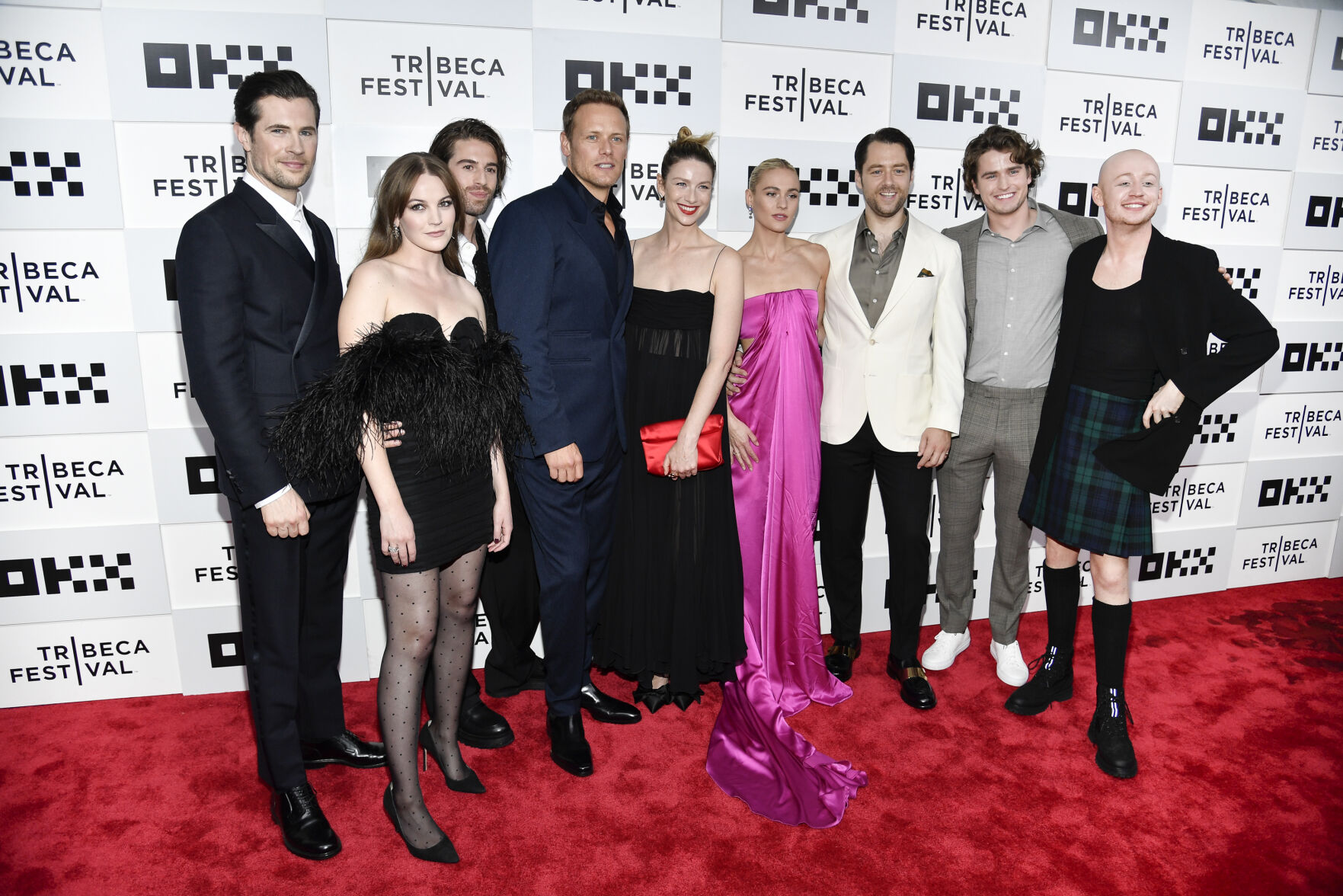 Actors David Berry, left, Izzy Meikle-Small, Joey Phillips, Sam Heughan, Caitriona Balfe, Sophie Skelton, Richard Rankin, Charles Vandervaart and John Bell pose together at the premiere of "Outlander" season 7 during the Tribeca Festival at the OKX Theater BMCC Tribeca Performing Arts Center on Friday, June 9, 2023, in New York.
