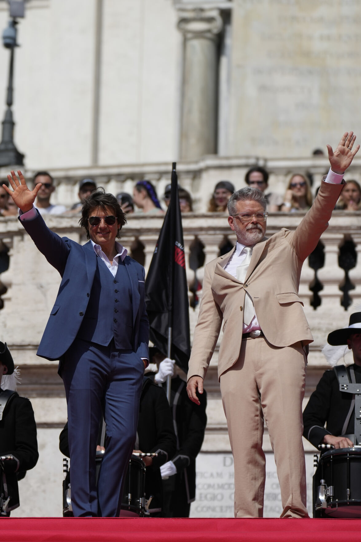 US producer and actor Tom Cruise (L) and US film director Christopher McQuarrie pose at Spanish Steps ahead of the premiere of "Mission: Impossible - Dead Reckoning Part One" movie in Rome, on June 19, 2023.
