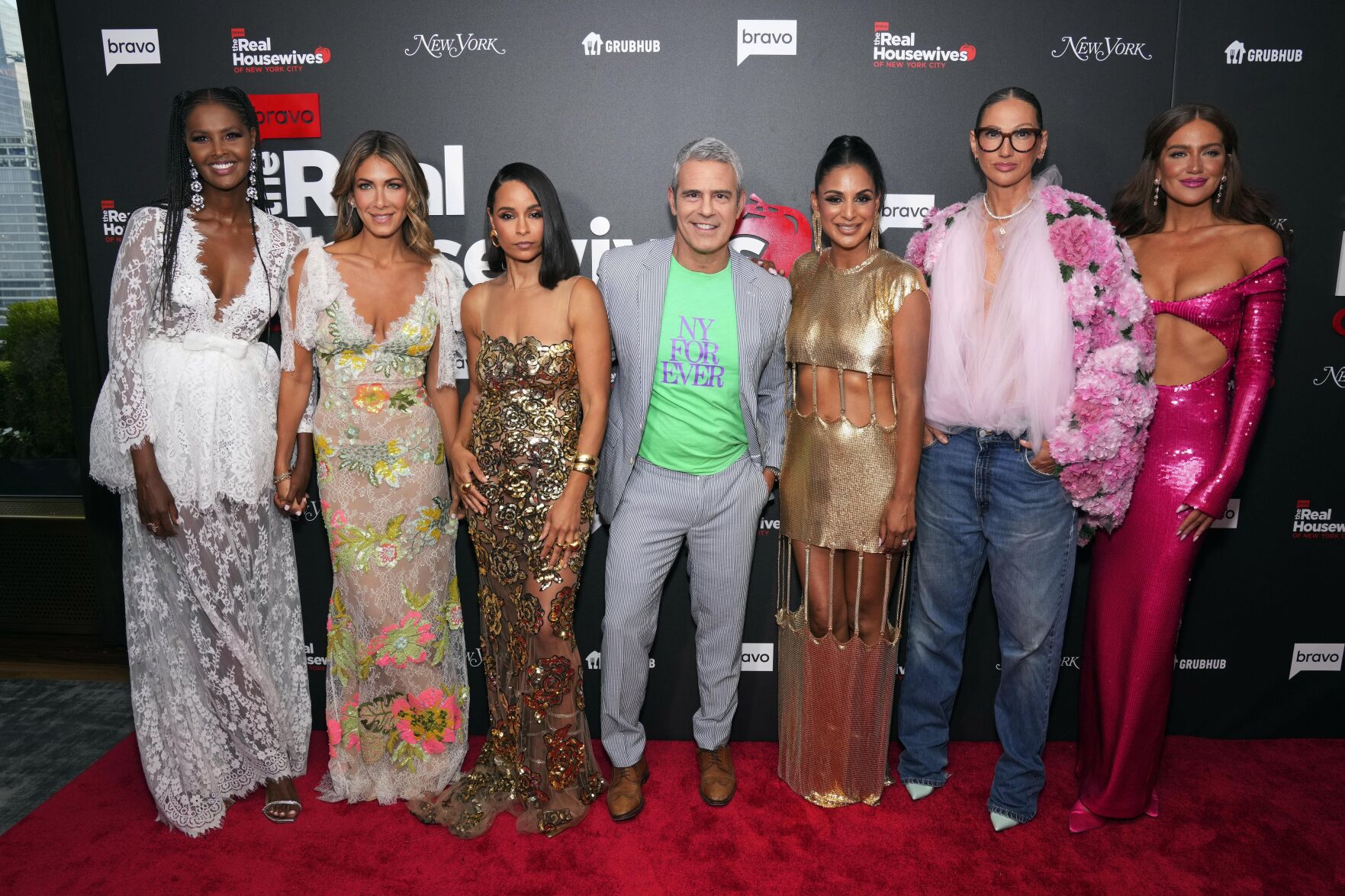 Ubah Hassan, from left, Erin Lichy, Sai De Silva, Andy Cohen, Jessel Taank, Jenna Lyons and Brynn Whitfield attend Bravo's "The Real Housewives of New York City" premiere party at the Rainbow Room on Wednesday, July 12, 2023, in New York. 