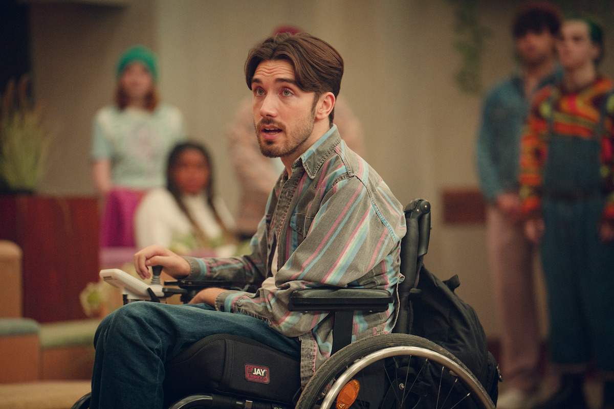 George Robinson as ISAAC in Season 4 of Sex Education.